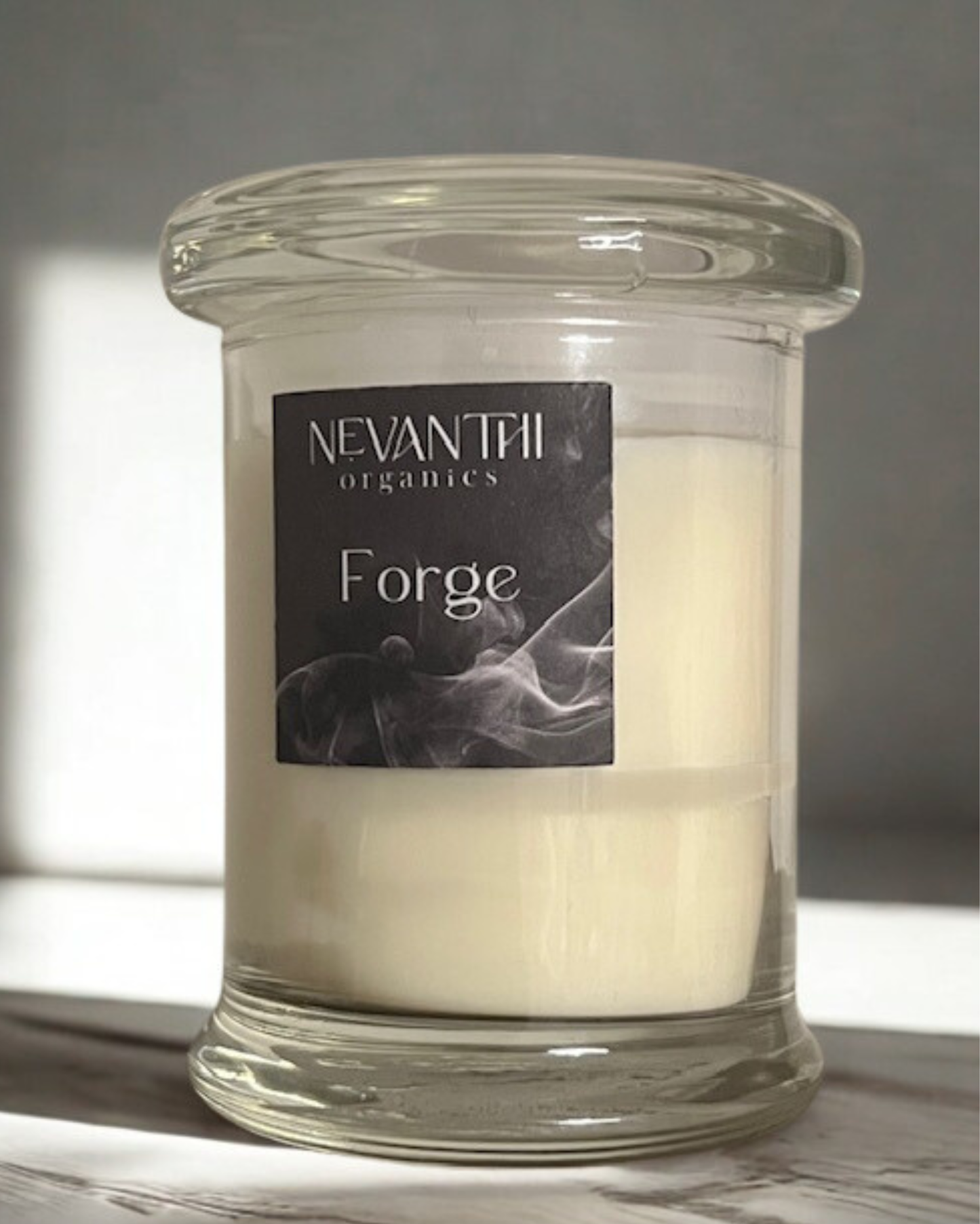 Forge candle — handmade UK seasonal soy candle with birch tar clove cedarwood and patchouli