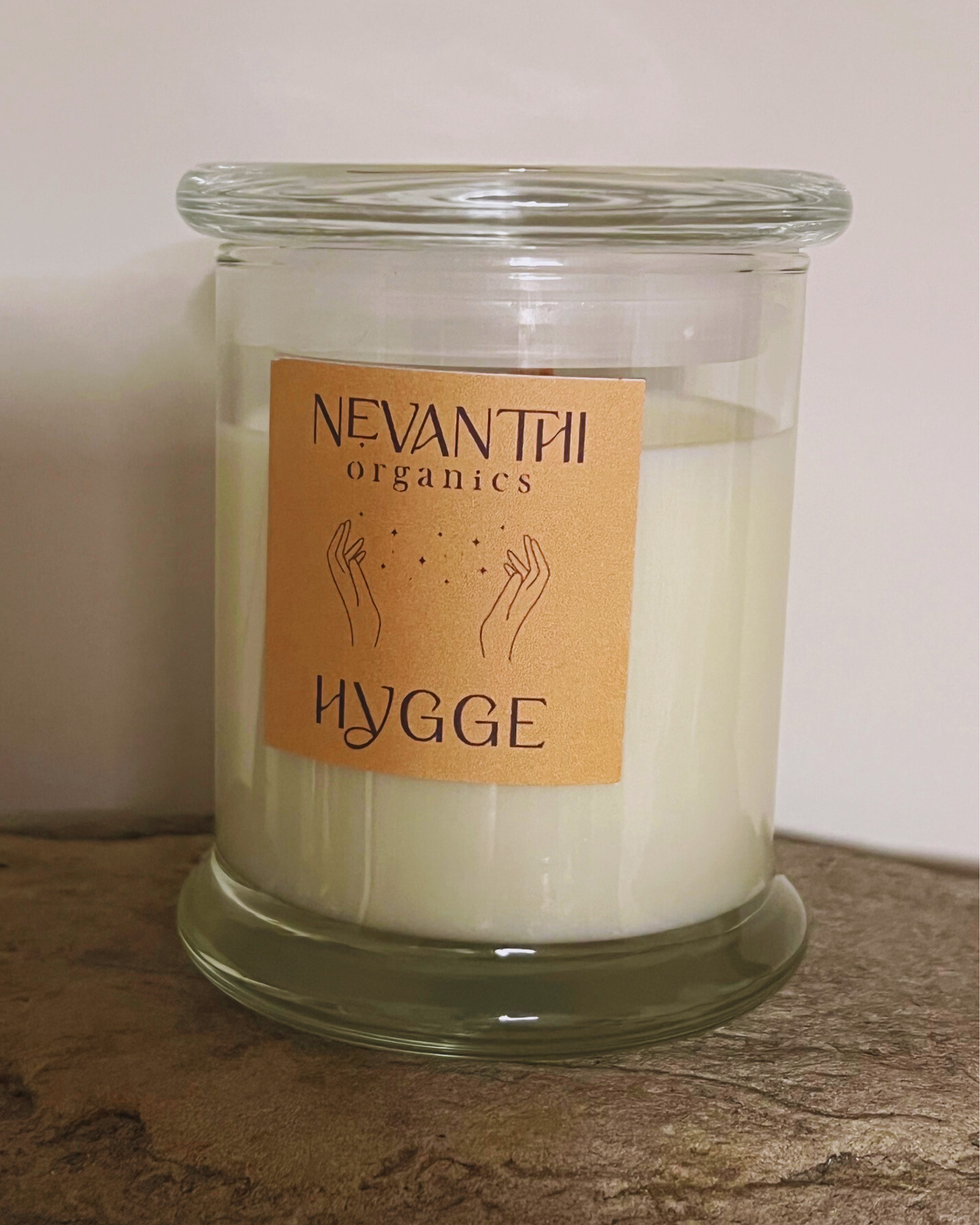 Hygge soy wax candle by Nevanthi Organics — wooden wick candle in clear glass jar