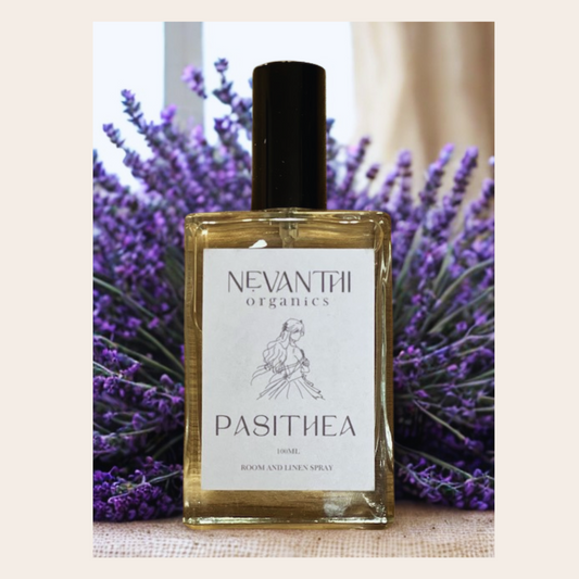 Nevanthii Organics Pasithea room and linen spray bottle with lavender in the background
Pasithea linen spray bottle with lavender and bergamot – calming pillow mist
