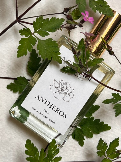 Antheros room and linen spray by Nevanthi Organics — 100ml luxury floral home fragrance with jasmine neroli and gardenia styled with ferns and wild flowers on white linen