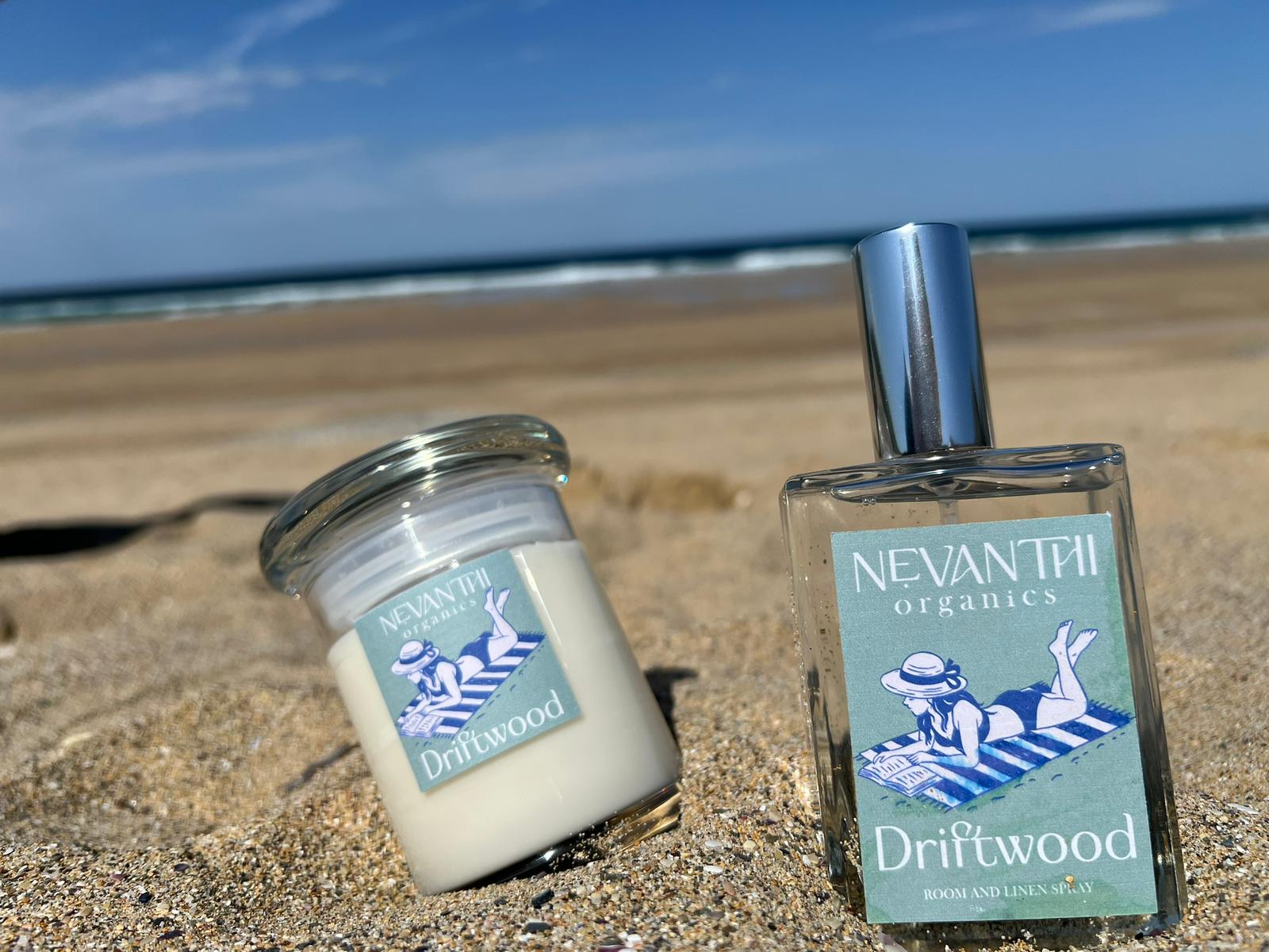 Driftwood room spray and soy candle by Nevanthi Organics — summer seasonal sage and sea salt fragrance collection on Norfolk beach