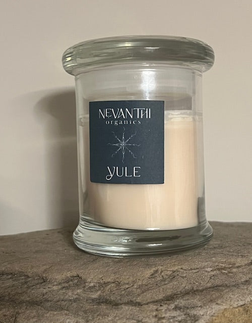 Yule candle lifestyle — handmade UK winter seasonal soy candle by Nevanthi Organics